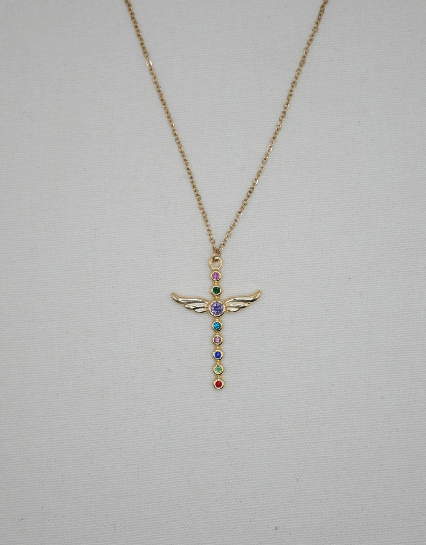 CRUZ ALADA MULTICOLOR