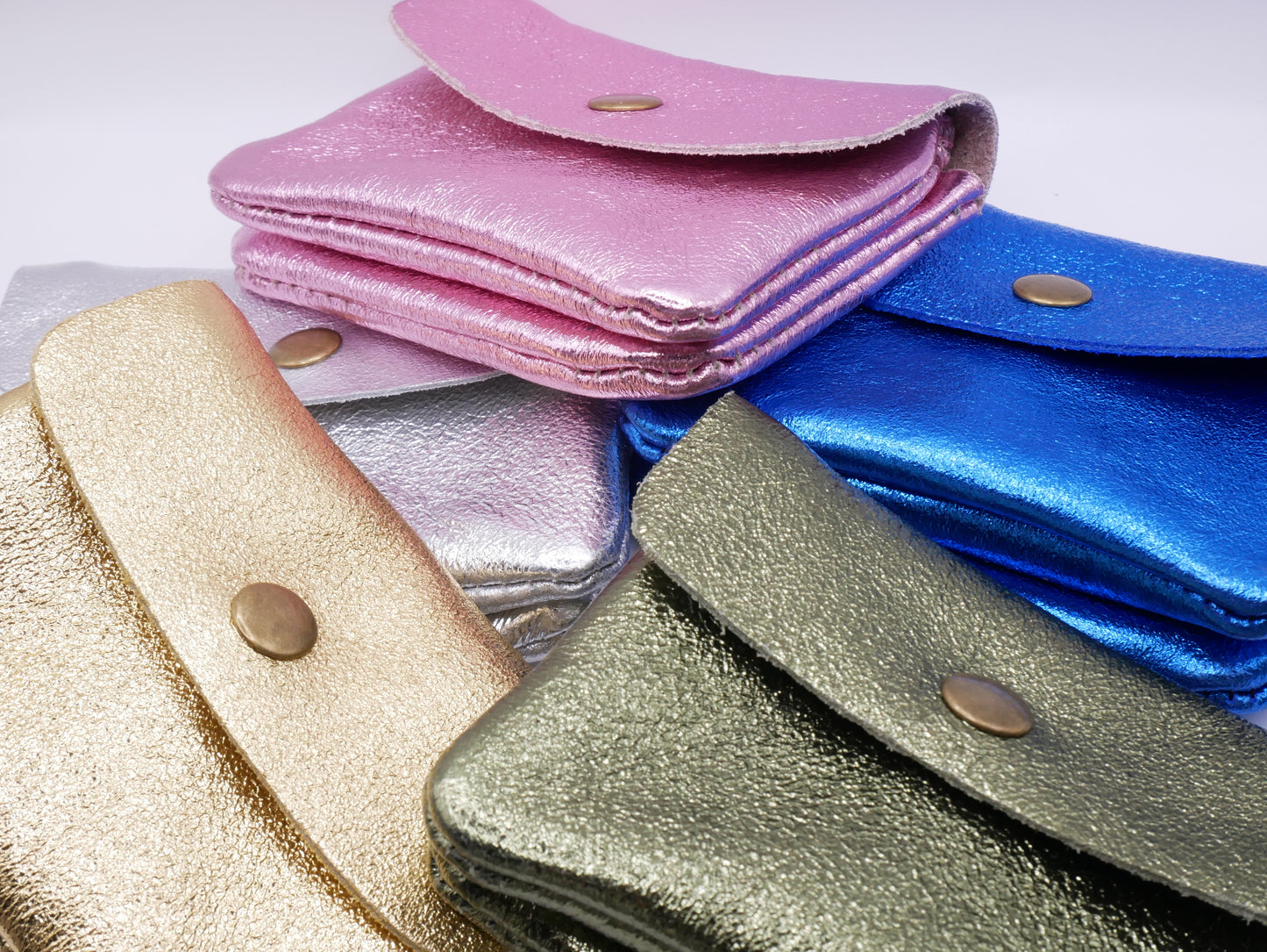 CARTERA ROCK PLATEADA
